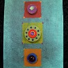 10 10 11 Heidi Bottle Cap Wall Art e1317351061207 Ultimate Green Crafting Guide: 201 Recycled Craft Ideas