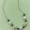 Geometric Gemstone and Pearl Knot Necklace