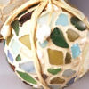 sand orbs and sea glass