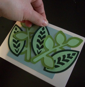 arranging leaves for Tropical Flowers Greeting Card